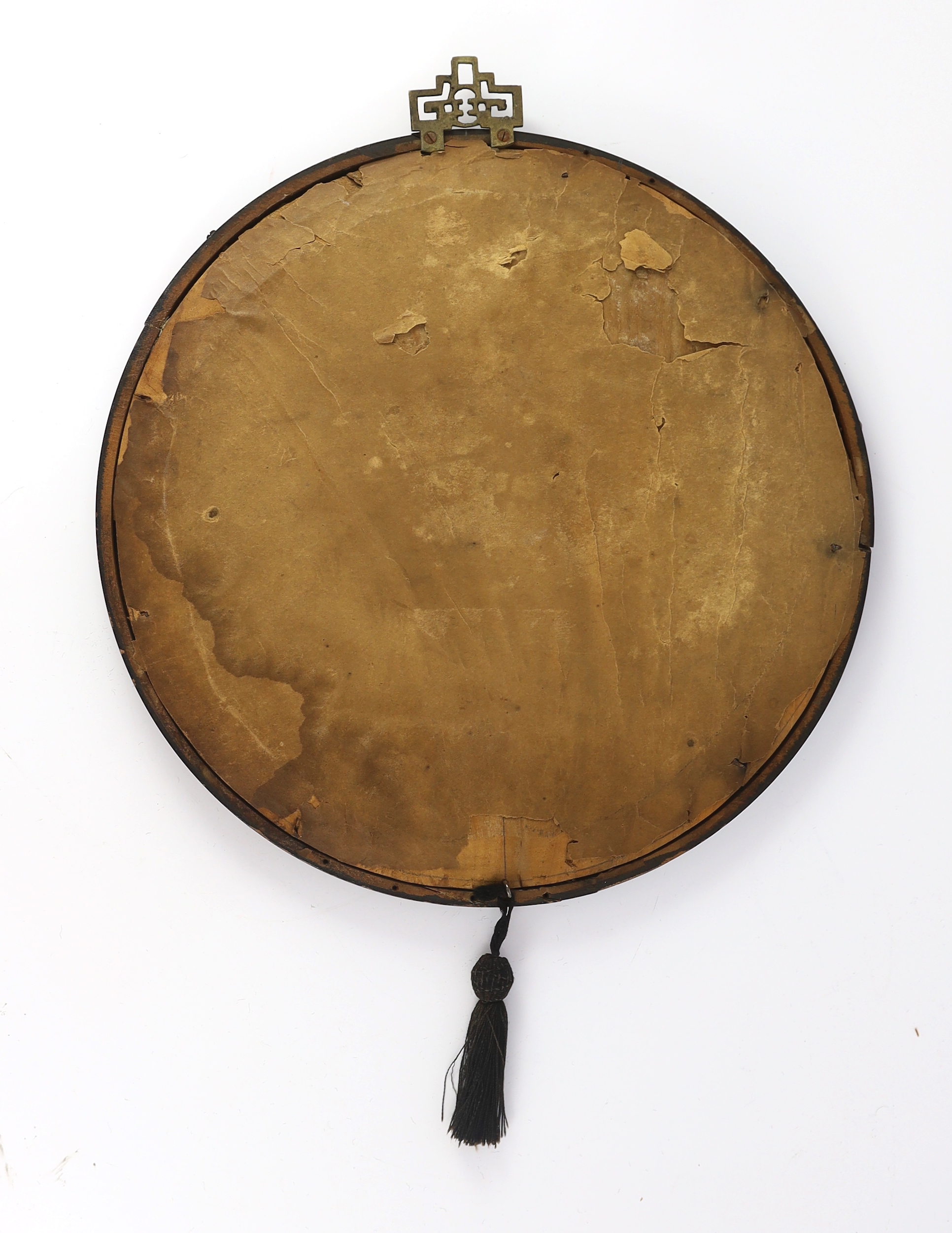 A Chinese wood and soapstone inlaid circular screen panel, late Qing dynasty